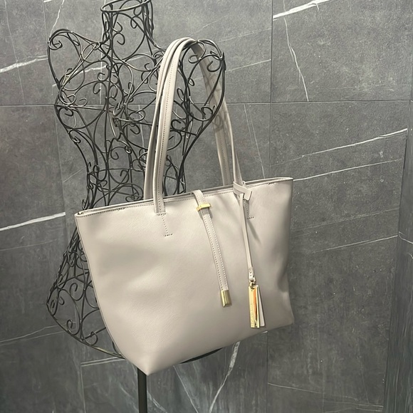 Vince Camuto Handbags - Vince Camuto NWT bag with dust bag.  Genuine leather Light beiges.  Retail $148